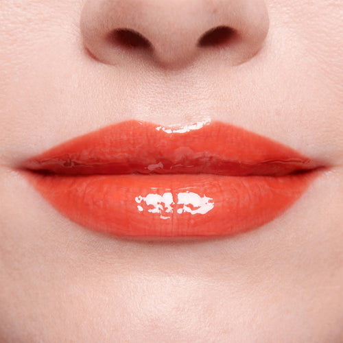 Image showing Dragon - Marilyn Monroe Edition (Gloss Embrace Lip Gloss) on model