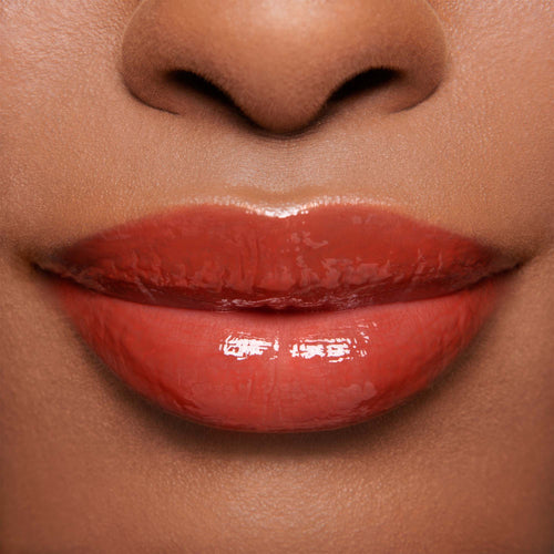 Image showing Dragon - Marilyn Monroe Edition (Gloss Embrace Lip Gloss) on model