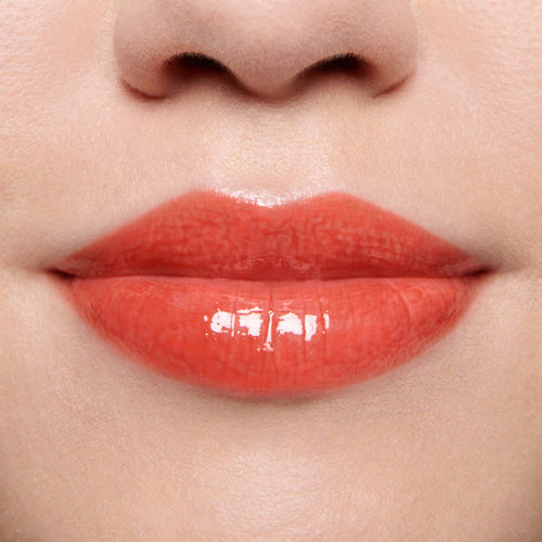 Image showing Dragon - Marilyn Monroe Edition (Gloss Embrace Lip Gloss) on model