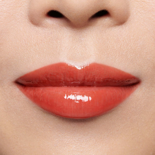 Image showing Dragon - Marilyn Monroe Edition (Gloss Embrace Lip Gloss) on model
