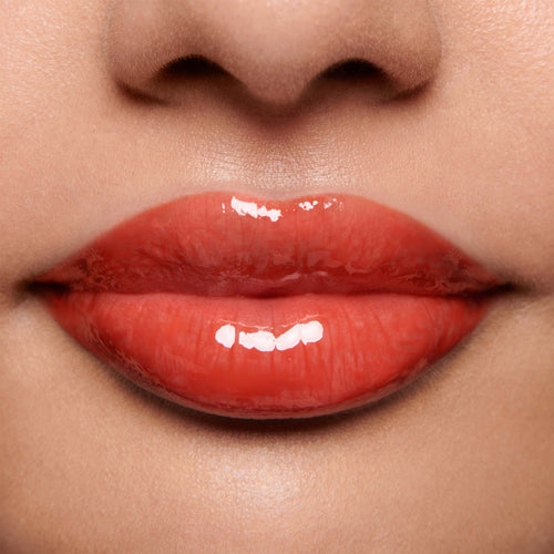 Image showing Dragon - Marilyn Monroe Edition (Gloss Embrace Lip Gloss) on model