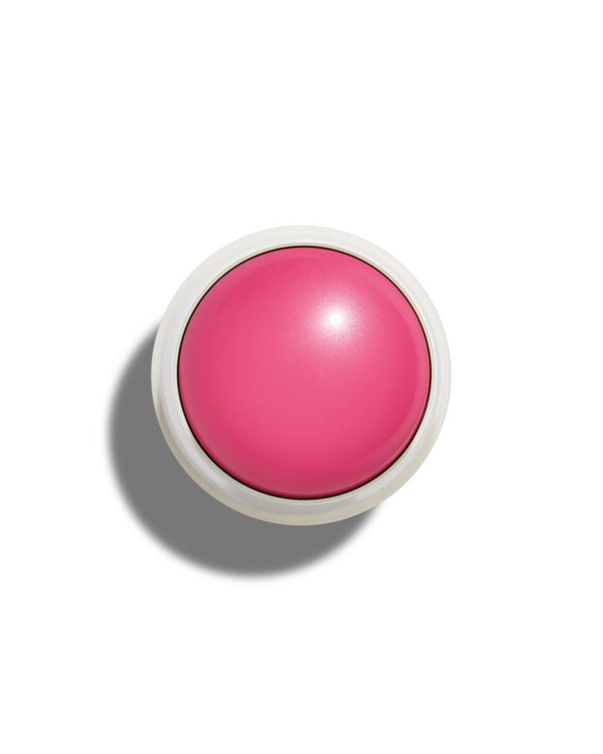 Meeting The Ex Velatura Balm with white casing on a white background.