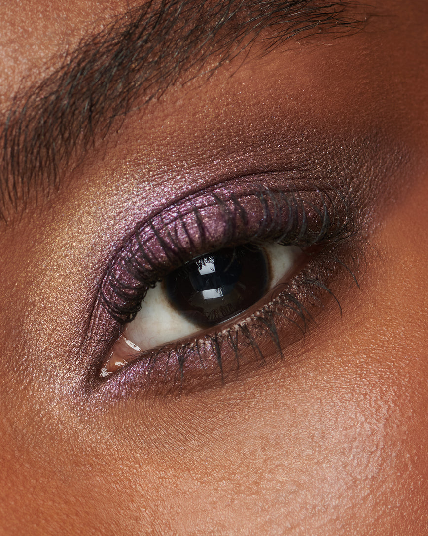 Extreme close-up of an eye with pink eyeshadow from Betty Eyeshadow Palette