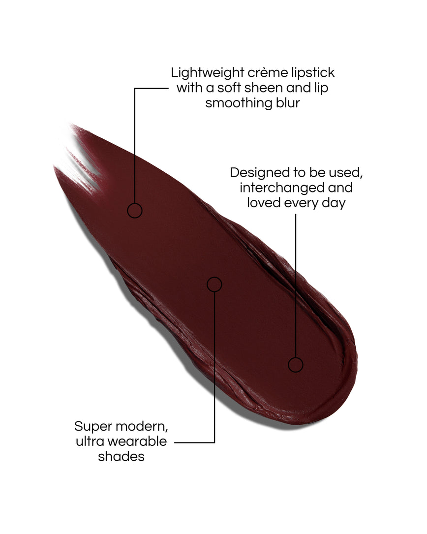 Rouge Experience Lipstick Refill swatch with text describing features on a white background, in shade Bohemian Cherry. Text reads: Lightweight creme lipstick with a soft sheen and lip smoothing blur. Designed to be used, interchanged and loved every day. Super modern, ultra wearable shades.