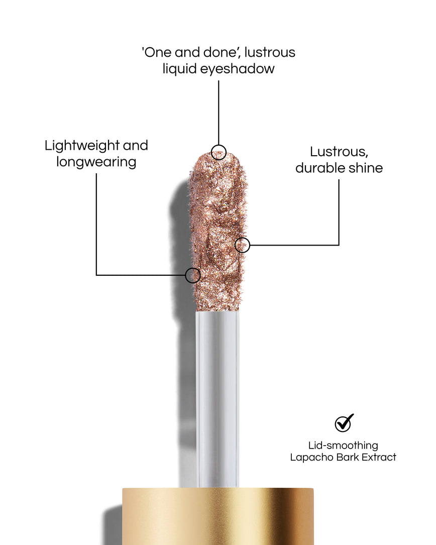 Liquid Lurex Eyeshadow applicator tip with text highlighting features: 'One and done', lustrous liquid eyeshadow. Lightweight and longwearing. Lustrous, durable shine. Lid-smoothing Lapacho Bark Extract. In shade Emily.