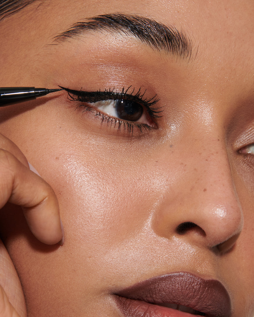kitten flick black eyeliner eyeshadow makeup for dark brown eyes and weddings