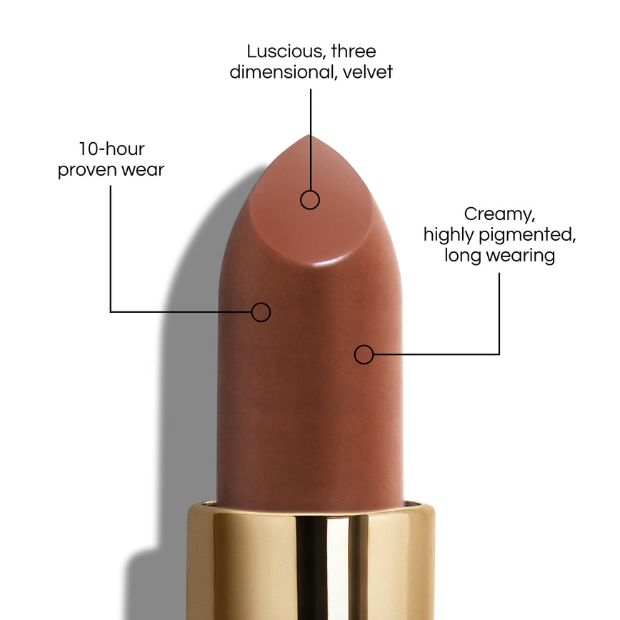 True Velvet Lip Colour bullet close-up, with text demonstrating it's benefits: Lucious, three dimensional, velvet. 10-hour proven wear. Creamy, highly pigmented, long wearing. In shade Fawn.