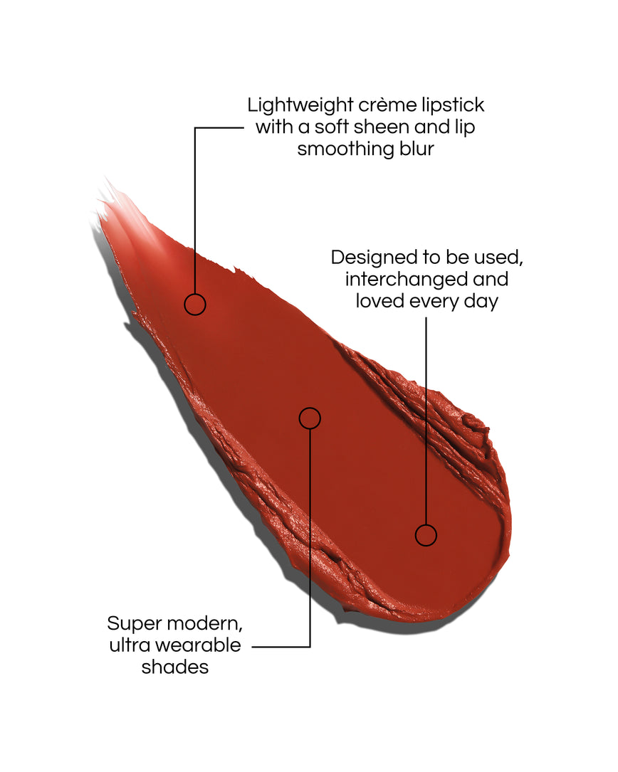 Rouge Experience Lipstick Refill swatch with text describing features on a white background, in shade Lili. Text reads: Lightweight creme lipstick with a soft sheen and lip smoothing blur. Designed to be used, interchanged and loved every day. Super modern, ultra wearable shades.