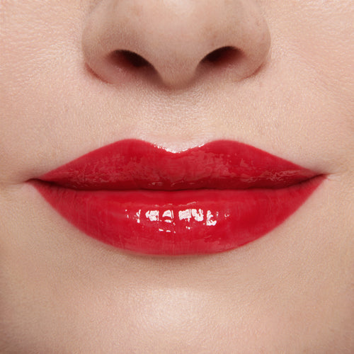 Image showing Ribbon - Marilyn Monroe Edition (Gloss Embrace Lip Gloss) on model