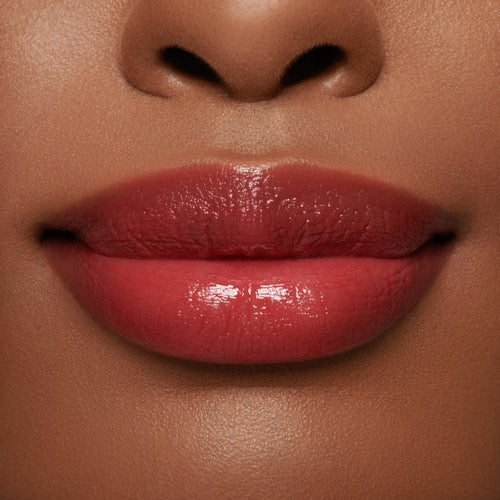 Image showing Ribbon - Marilyn Monroe Edition (Gloss Embrace Lip Gloss) on model