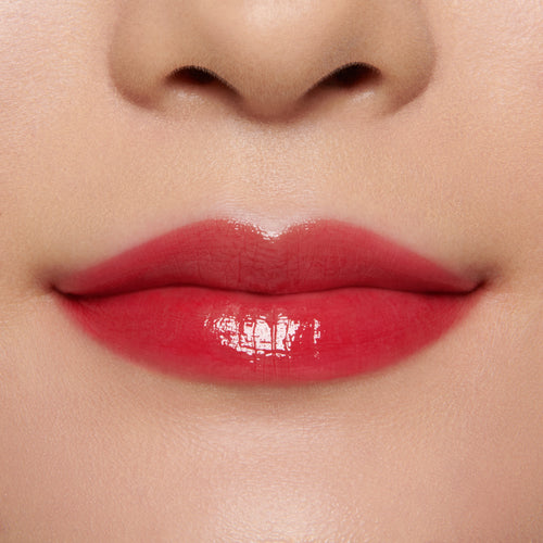 Image showing Ribbon - Marilyn Monroe Edition (Gloss Embrace Lip Gloss) on model