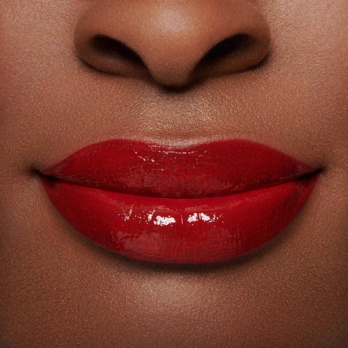 Image showing Ribbon - Marilyn Monroe Edition (Gloss Embrace Lip Gloss) on model