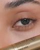 Video of model showing the Kitten Lash Mascara in Burnt Umber - application to lashes, smiling and winking.