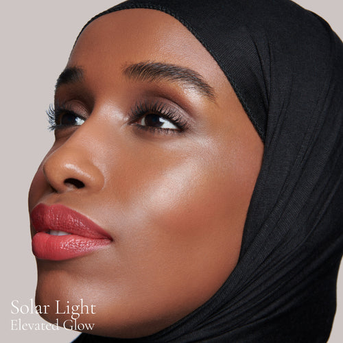 Image showing Solar Light (Elevated Glow Highlighter) on model