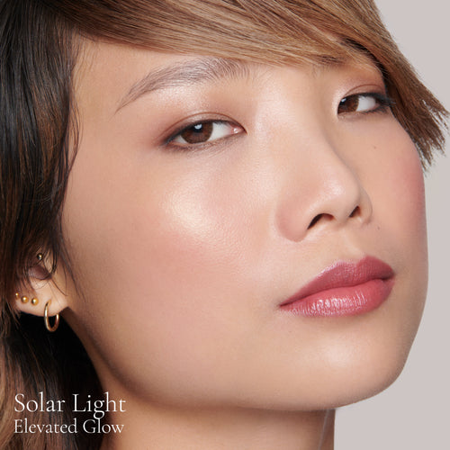 Image showing Solar Light (Elevated Glow Highlighter) on model