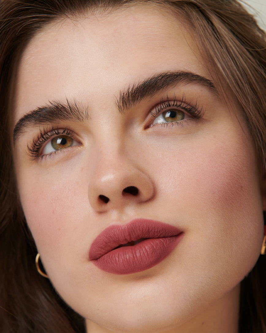 Lisa Eldridge Velveteen Liquid Lipstick in shade Blush pictured on model