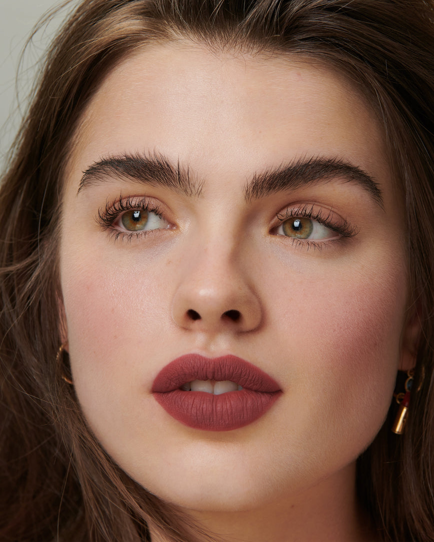 Lisa Eldridge Velveteen Liquid Lipstick in shade Blush pictured on model