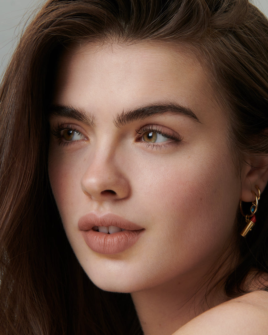 Lisa Eldridge Velveteen Liquid Lipstick in shade Fawn pictured on model