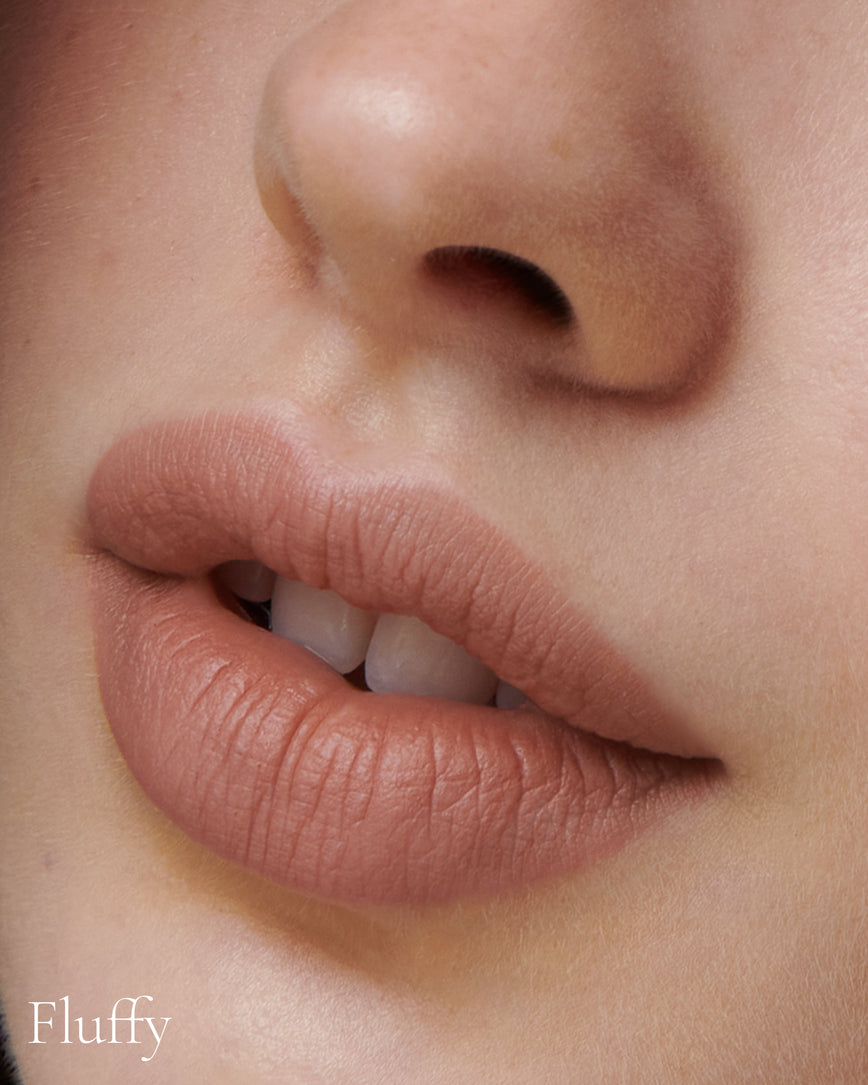 Lisa Eldridge Velveteen Liquid Lipstick in shade Fawn pictured on model