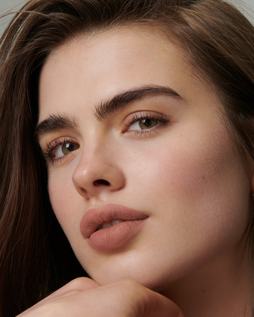 Lisa Eldridge Velveteen Liquid Lipstick in shade Fawn pictured on model