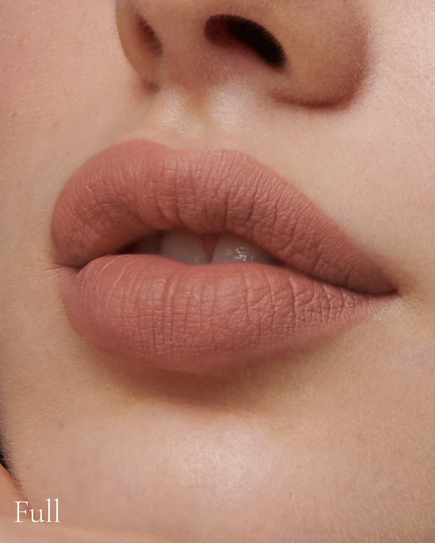 Lisa Eldridge Velveteen Liquid Lipstick in shade Fawn pictured on model