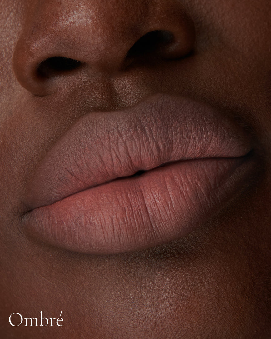Lisa Eldridge Velveteen Liquid Lipstick in shade Fawn pictured on model