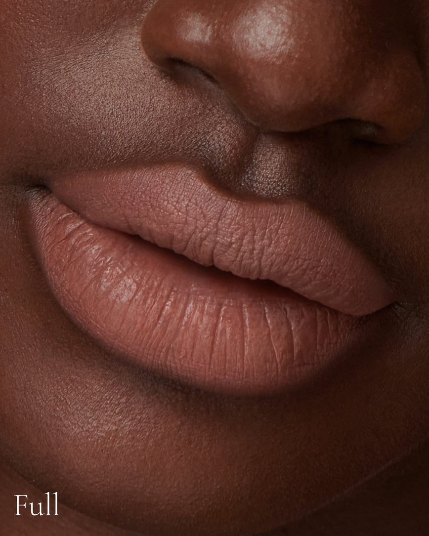 Lisa Eldridge Velveteen Liquid Lipstick in shade Fawn pictured on model