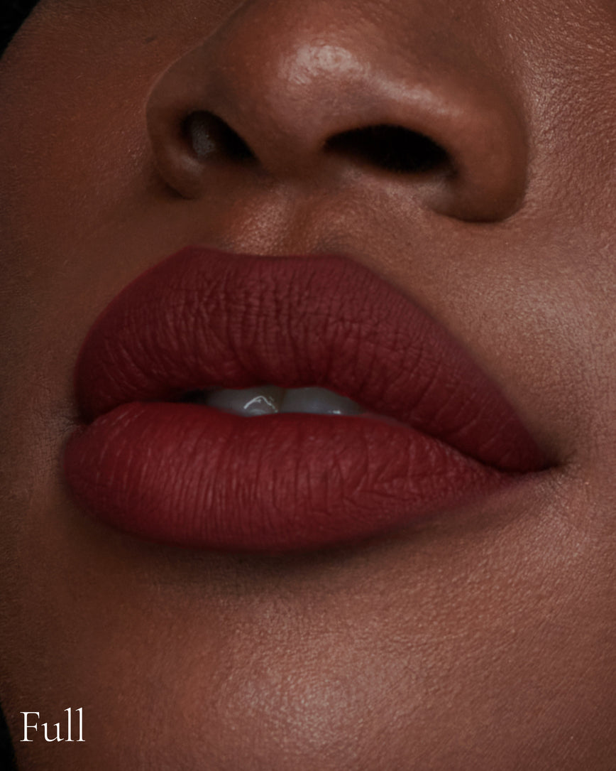 Lisa Eldridge Velveteen Liquid Lipstick in shade Jazz pictured on model